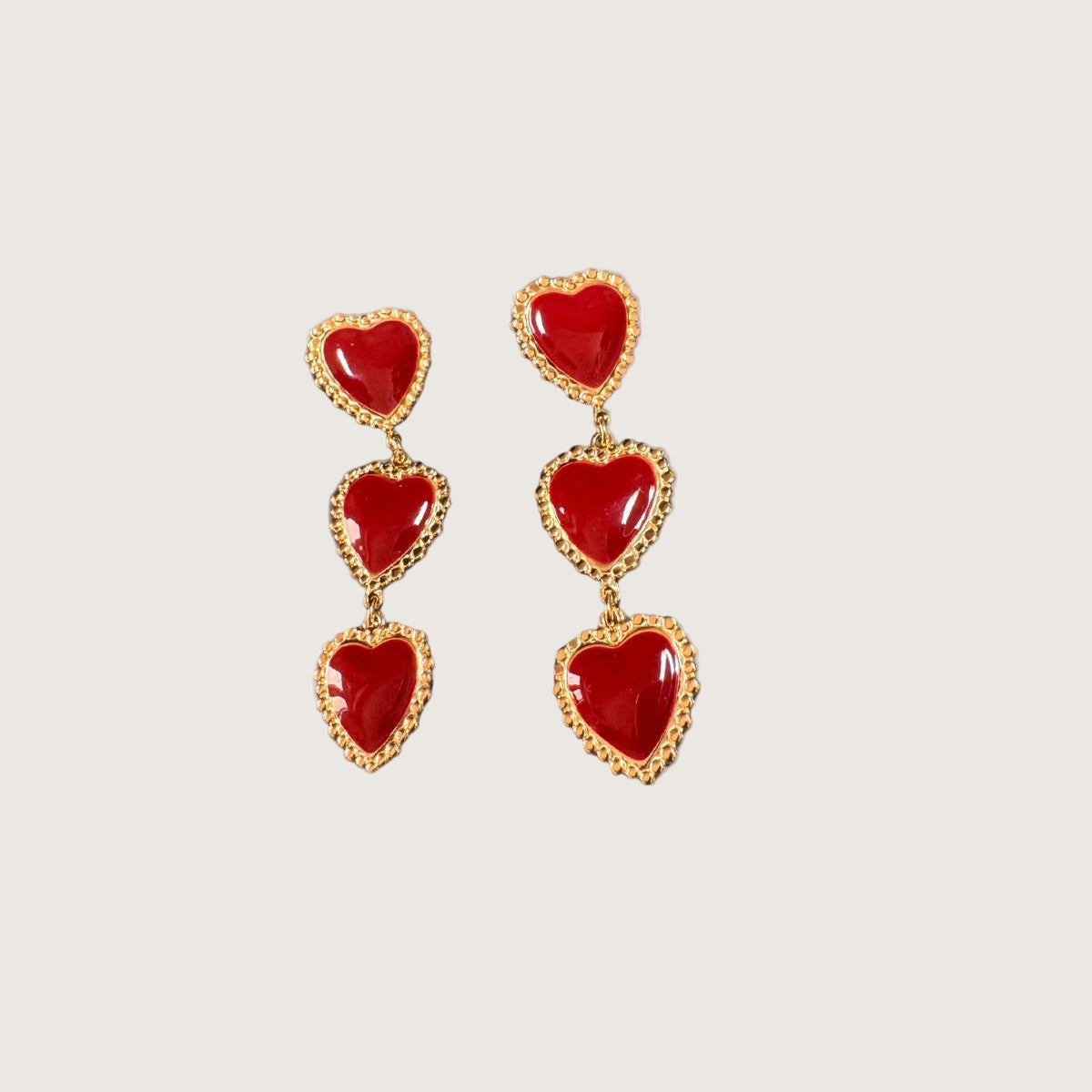 Boucles d’oreilles pendantes cœurs rouges
