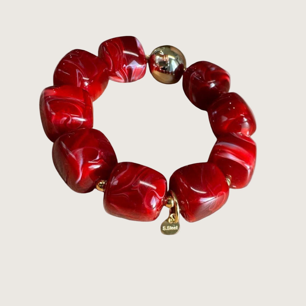 Bracelet élastique en résine rouge 