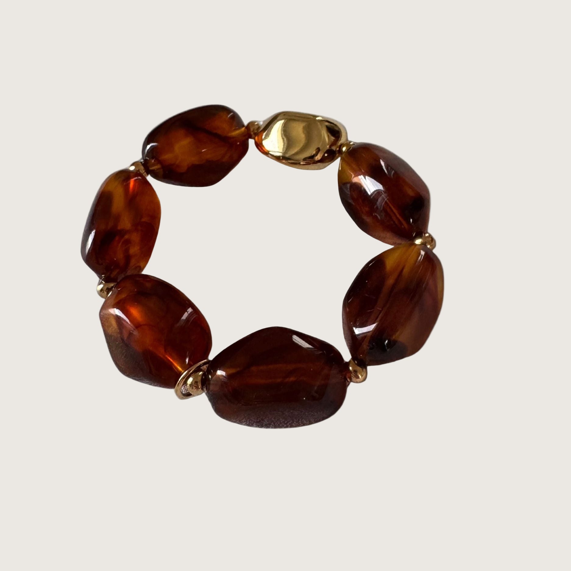 Bracelet en résine marron de forme géométrique doré 