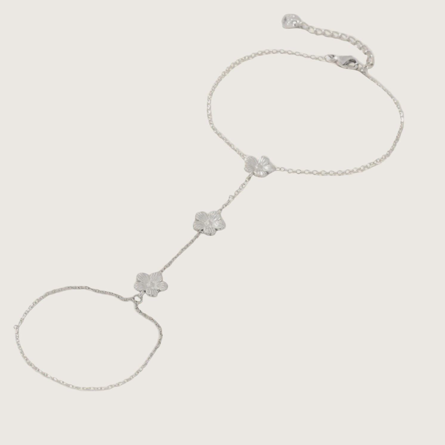 Chaîne de main argenté avec fleurs 